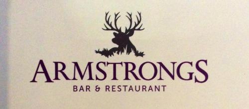 a logo for an antlers bar and restaurant at Drumshademuir Caravan & Camping Park in Glamis