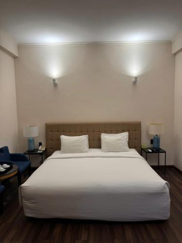 Katil atau katil-katil dalam bilik di Liberty 2 Hotel