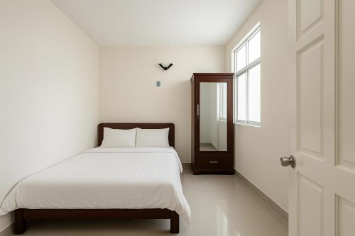 Postel nebo postele na pokoji v ubytování LAM ANH Hotel