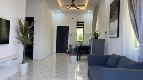 Телевизор и/или развлекательный центр в NEW ! ! Johari Homestay Perlis
