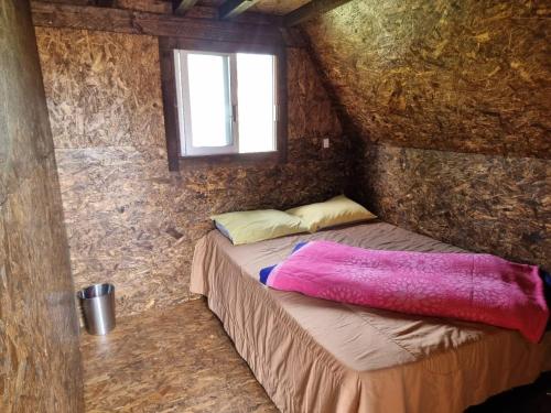 Postel nebo postele na pokoji v ubytování Valle Colibrí