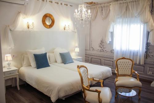 Postel nebo postele na pokoji v ubytování Hotel Pepo