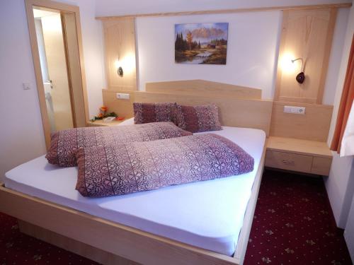 Postel nebo postele na pokoji v ubytování Haus Talblick