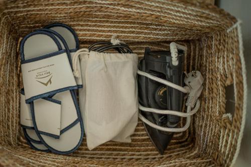 aicker basket with a football equipment and a ball and a ball at Villa Lemone by Bali Villa Solutions in Seminyak