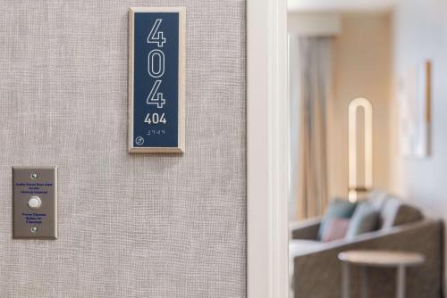 a sign on the wall of a room at Homewood Suites By Hilton Thornton Denver in Thornton