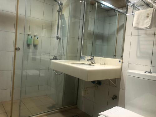 Koupelna v ubytování 天璽商務飯店 Cullinan Hotel