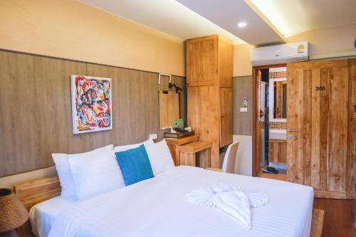 Ένα ή περισσότερα κρεβάτια σε δωμάτιο στο GOYA hotel