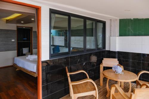 Ένα ή περισσότερα κρεβάτια σε δωμάτιο στο GOYA hotel