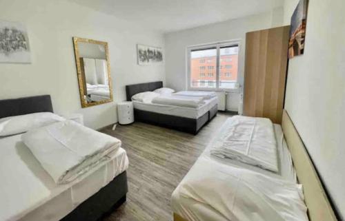 Ένα ή περισσότερα κρεβάτια σε δωμάτιο στο City Apartment