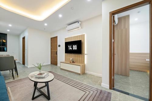 Hanoi Cosmos Hotelにあるテレビまたはエンターテインメントセンター