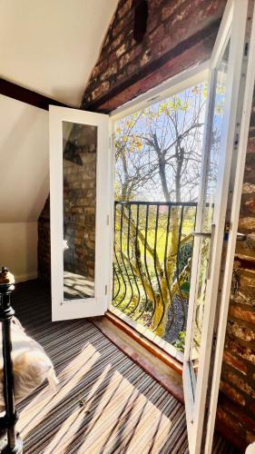 Balkón nebo terasa v ubytování Poplar farm annexe