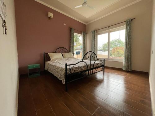 Postel nebo postele na pokoji v ubytování Inaara