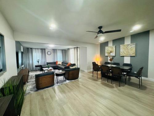 a living room with a couch and a table at Entire House near DTLV in Las Vegas