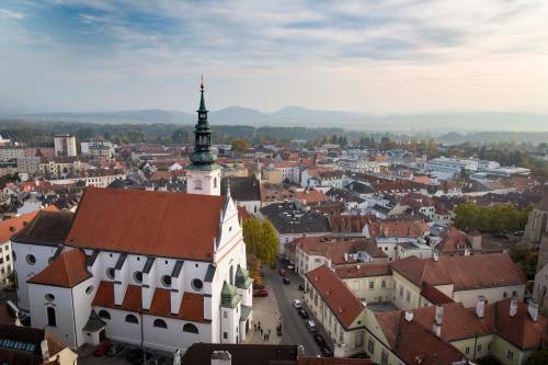 an aerial view of a city with a church at Urban Stays Apartments Krems in Krems an der Donau