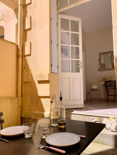 Appartement traversant - 20m plage - Cours privée