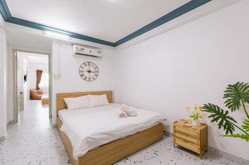 Cama o camas de una habitación en Elysian Home