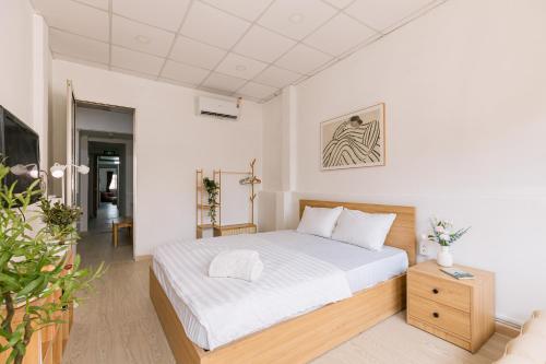 Cama o camas de una habitación en Elysian Home