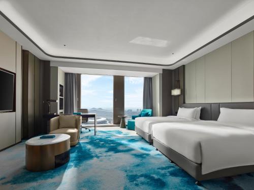 Posezení v ubytování Wyndham Grand Zaozhuang