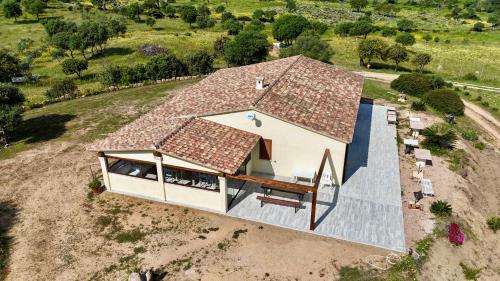an overhead view of a small house with a roof at Molti Mari B&B Resort in Olbia