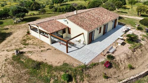 an aerial view of a house on a hill at Molti Mari B&B Resort in Olbia