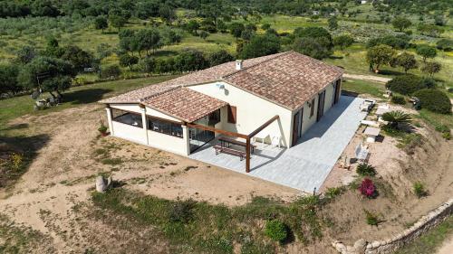 an overhead view of a house on a hill at Molti Mari B&B Resort in Olbia