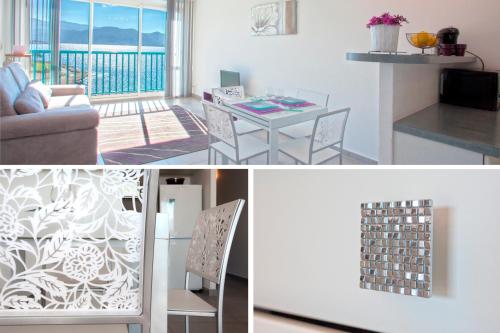 ein Wohnzimmer und ein Esszimmer mit einem Tisch in der Unterkunft Studio Marine du Soleil in Patrimonio