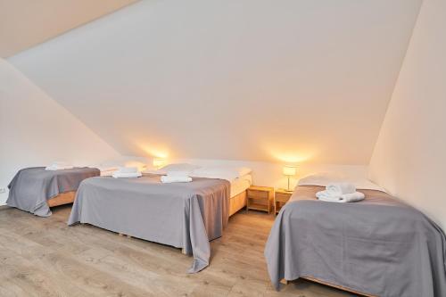 Ένα ή περισσότερα κρεβάτια σε δωμάτιο στο Hotel Obzor