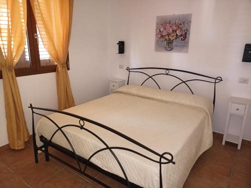 Ένα ή περισσότερα κρεβάτια σε δωμάτιο στο Case Cilento Mare