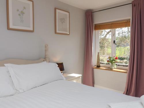 Postel nebo postele na pokoji v ubytování Magnolia View