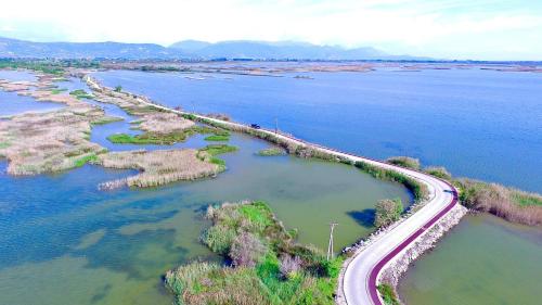 an aerial view of a river with a highway at Villa Guesthouse Albion in Lezhë