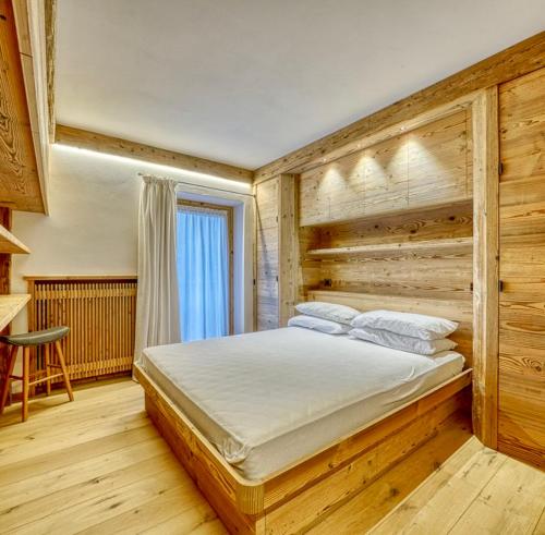Postel nebo postele na pokoji v ubytování Luxury apartment in Cortina