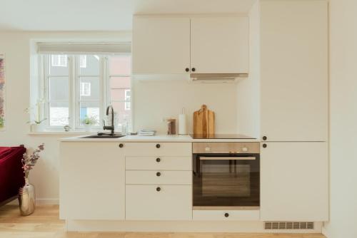 Η κουζίνα ή μικρή κουζίνα στο Studio Apartment in the Heart of Tórshavn
