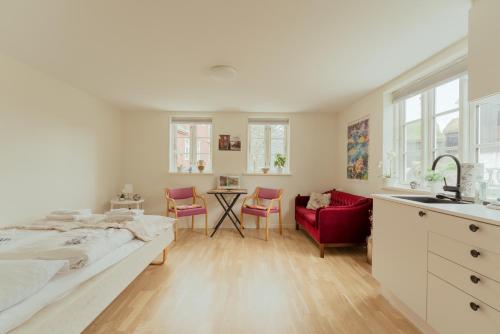 Ένα ή περισσότερα κρεβάτια σε δωμάτιο στο Studio Apartment in the Heart of Tórshavn