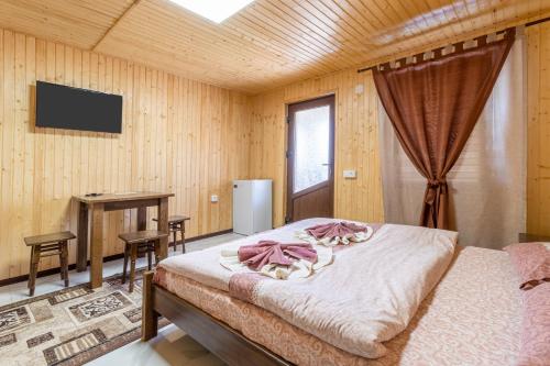 Postel nebo postele na pokoji v ubytování ASTORIA