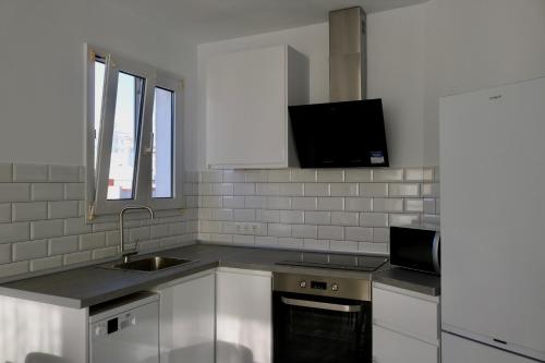 Kuchyň nebo kuchyňský kout v ubytování Apartamento Azul Salado
