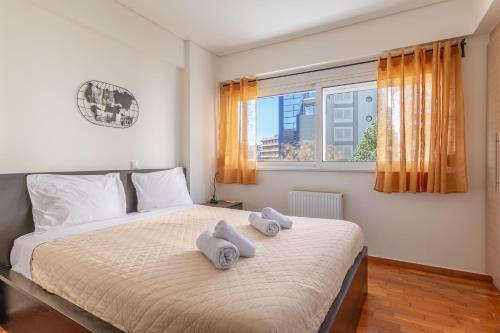 Postel nebo postele na pokoji v ubytování Elvita Apartments 2