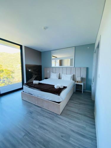 Letto o letti in una camera di DOBAU village