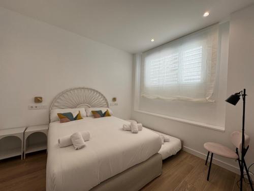 Ένα ή περισσότερα κρεβάτια σε δωμάτιο στο Arroyo 3 Apartments