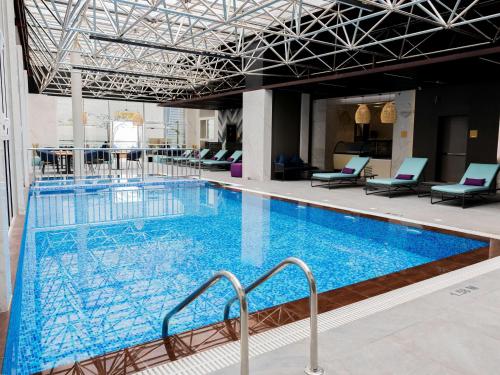 Bazén v ubytování Mercure Riyadh Al Anoud nebo v jeho okolí