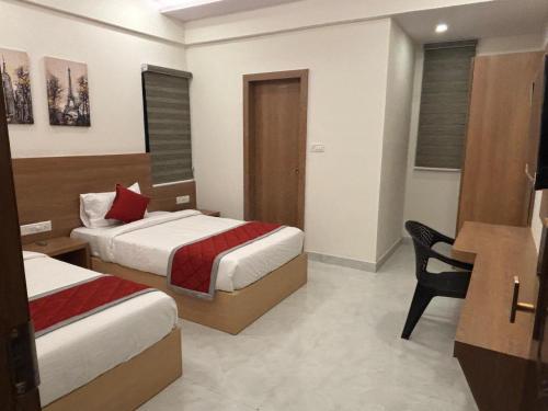 Cama o camas de una habitación en Mirage Suites
