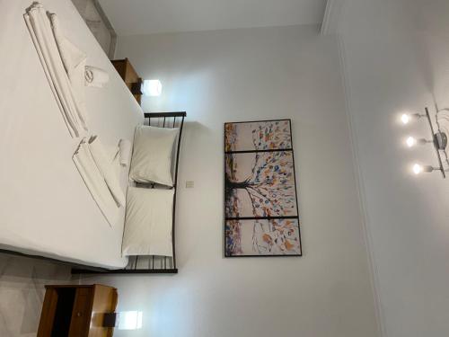 a room with two pieces of art on the wall at Villa Alexandra Ierissos in Ierissos