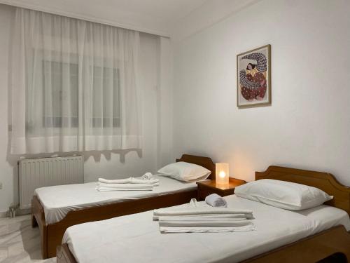 Postel nebo postele na pokoji v ubytování Villa Alexandra Ierissos