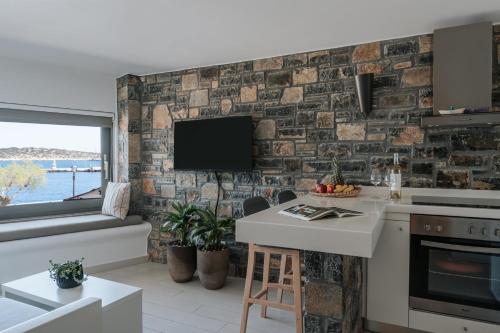 Η κουζίνα ή μικρή κουζίνα στο Seannamon Apartment with sea view by 8essentially