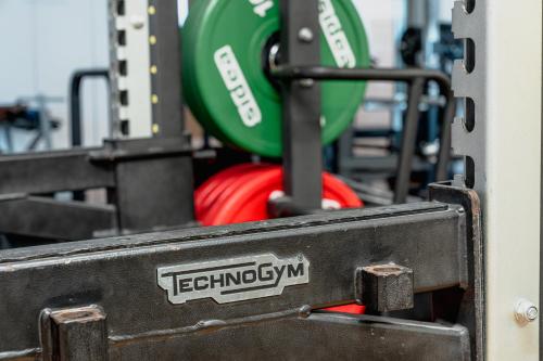 a close up of a machine with a green object at Mercure Olbia in Olbia