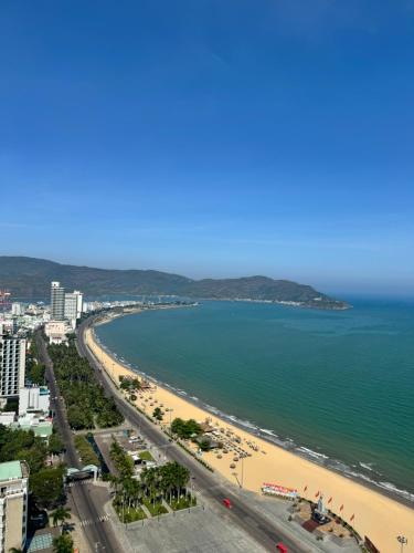 an aerial view of a beach and the ocean at TMS Quy Nhơn - Hupa Apartment View Biển in Quy Nhon