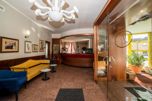 Χώρος καθιστικού στο Hotel Victoria
