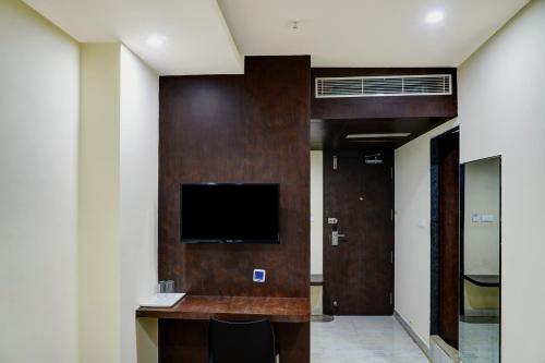 TV a/nebo společenská místnost v ubytování Townhouse Dev's Inn by CJ