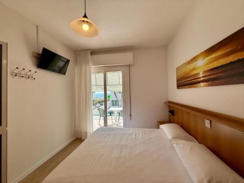 Postel nebo postele na pokoji v ubytování Hotel Palme Park & Beach included