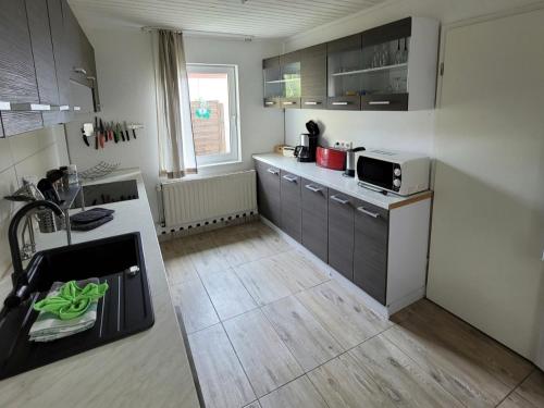Kuchyň nebo kuchyňský kout v ubytování FeWo Renken