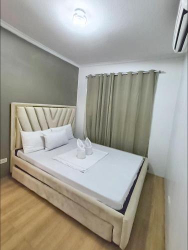 Ein Bett oder Betten in einem Zimmer der Unterkunft One Oasis Condo beside SM Mall